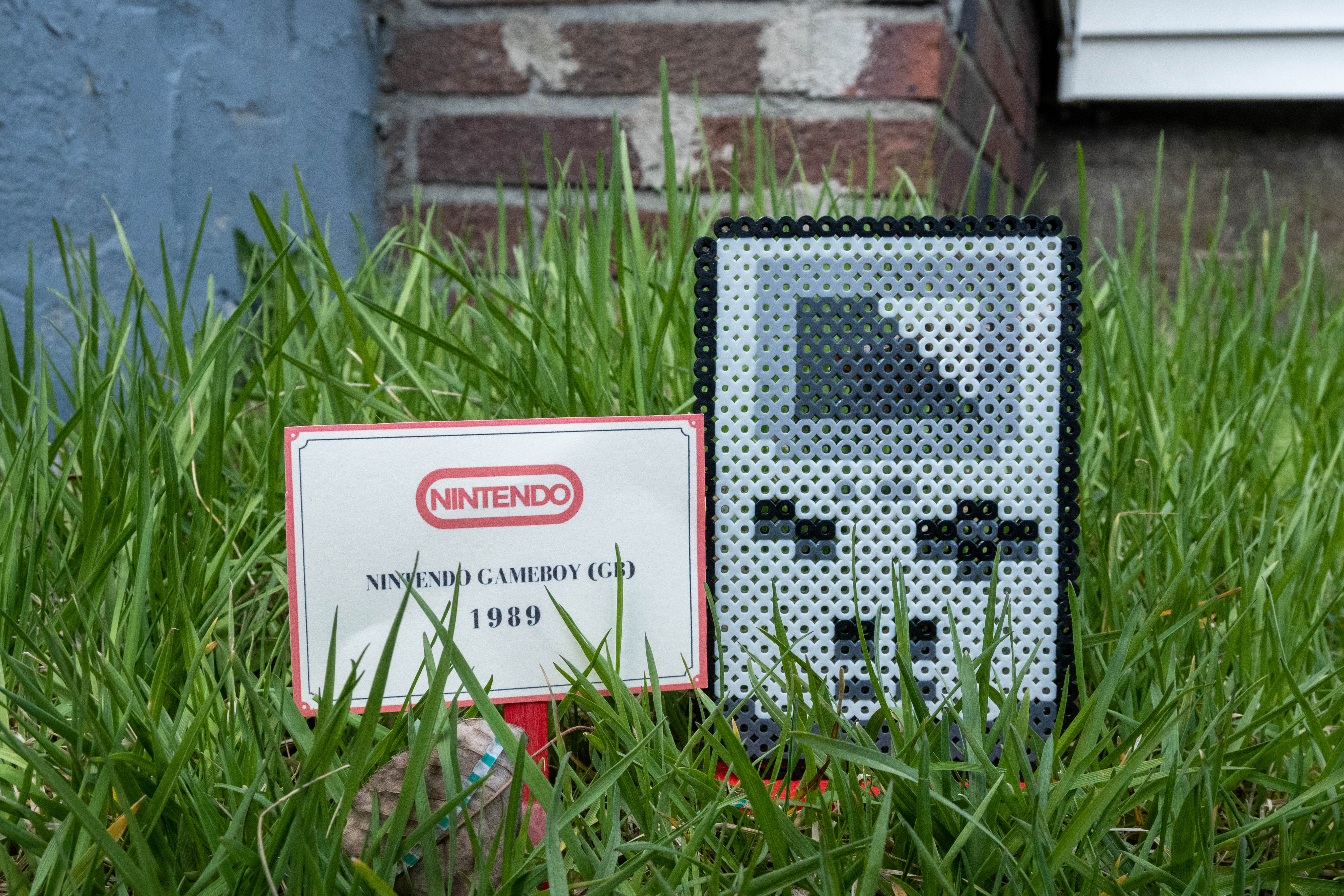 Grey Gameboy made out of Perler fuse beads.