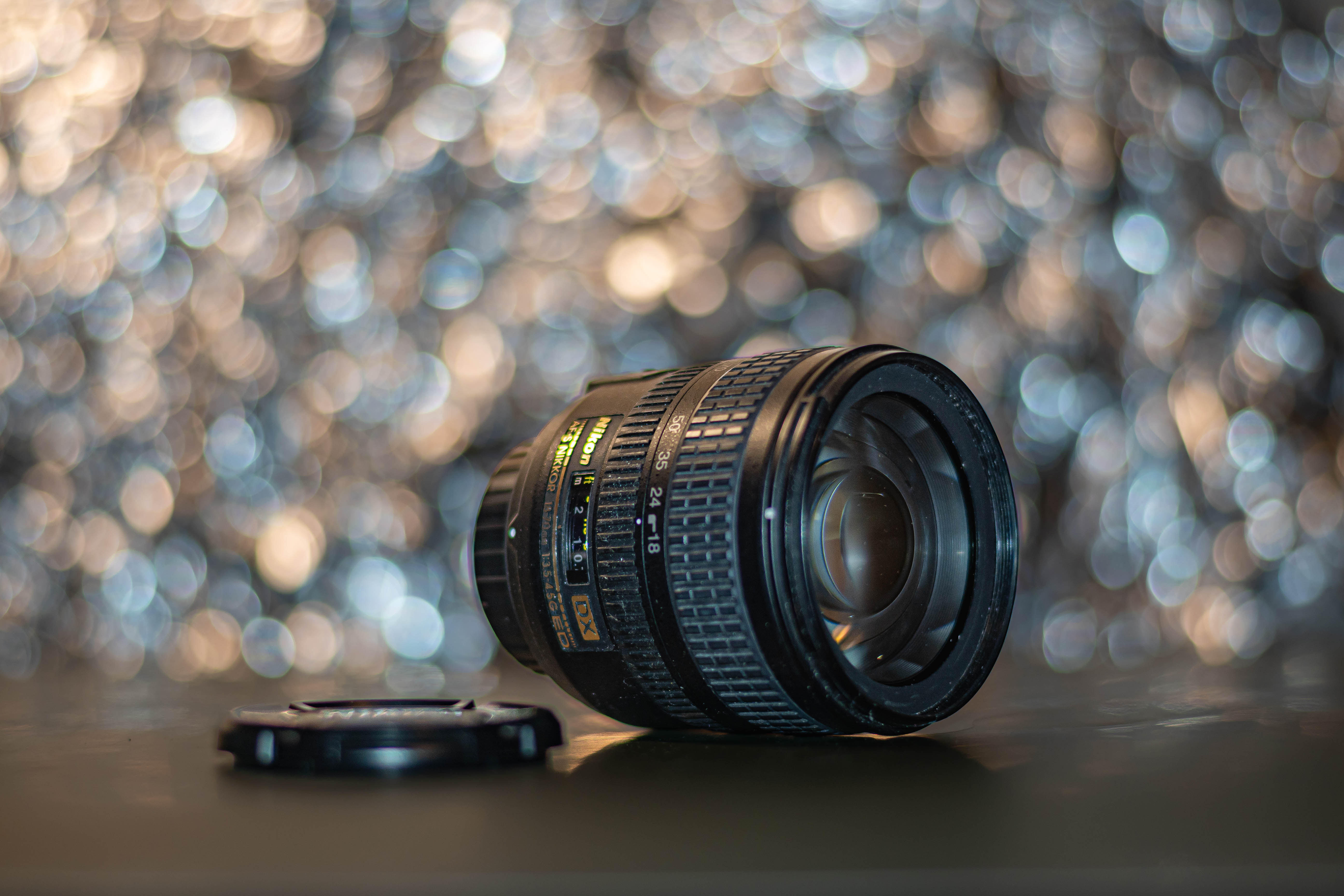 Nikon Lens against sparkle background